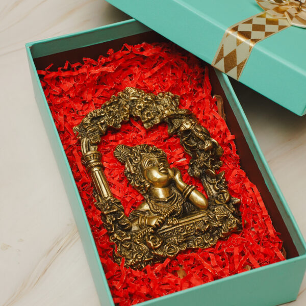Brass Krishna wall hanging / statue depicting Lord Krishna.
