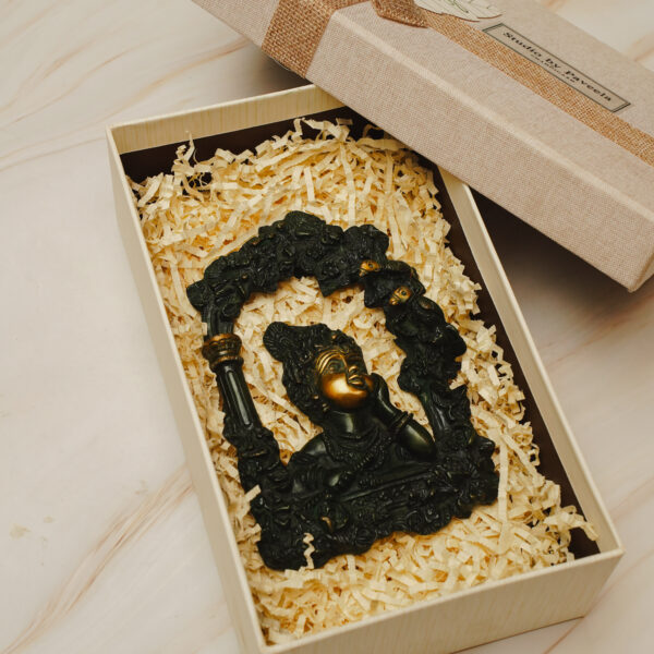 Brass Krishna wall hanging / statue depicting Lord Krishna.